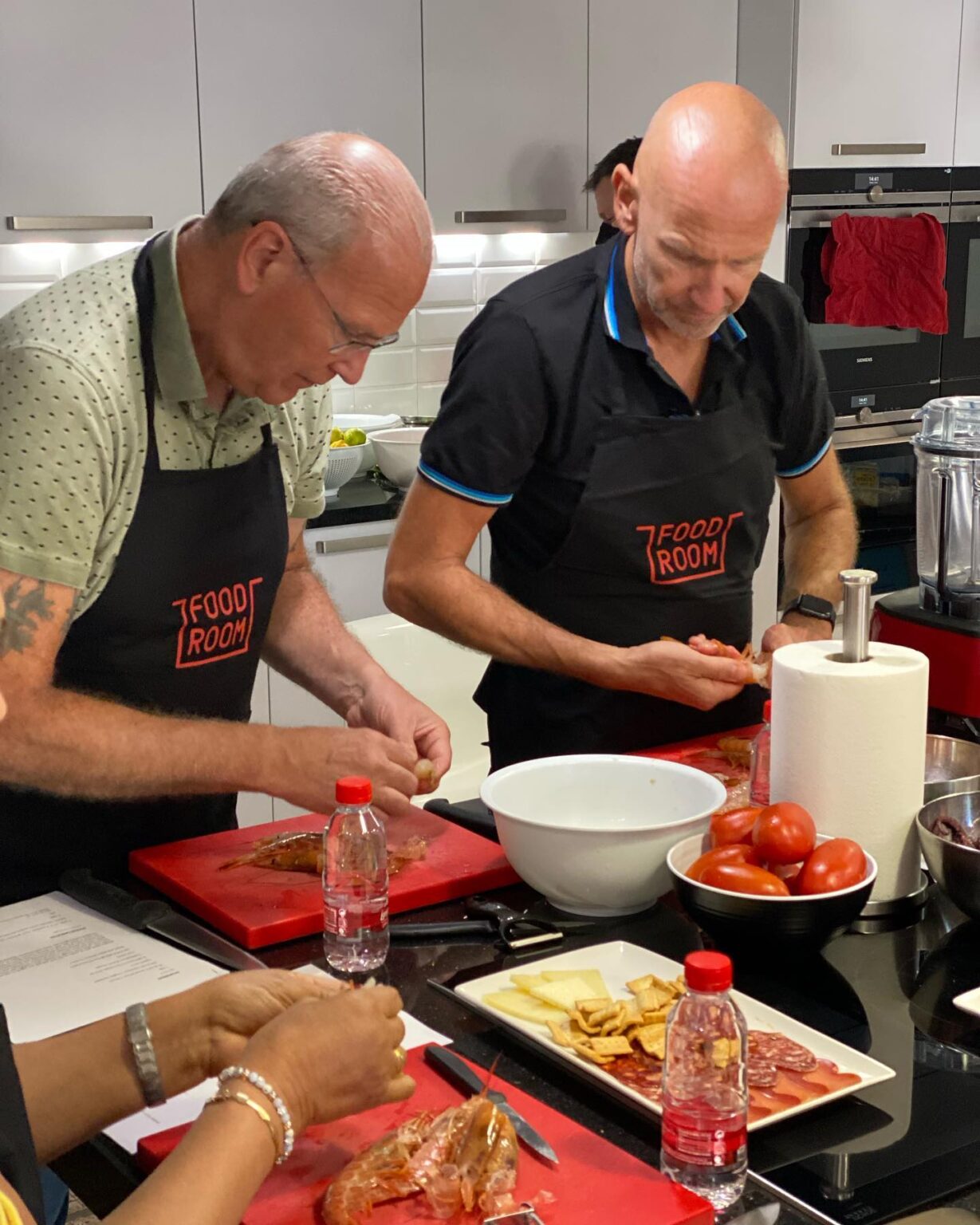 spanish-cooking-two-men-cleaning-shrimps